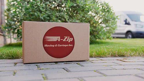 Moving box with azip logo on the front of it