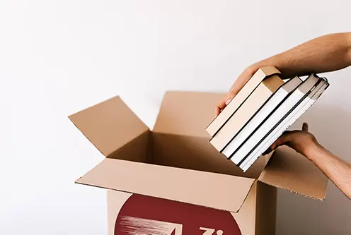 Packing a stack of books into an A-Zip box