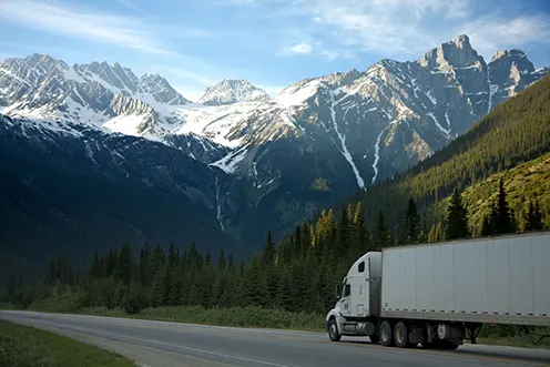 A transport truck on a mountain highway