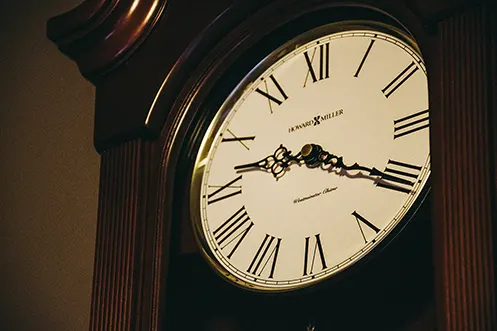 Close up of grandfather clock face